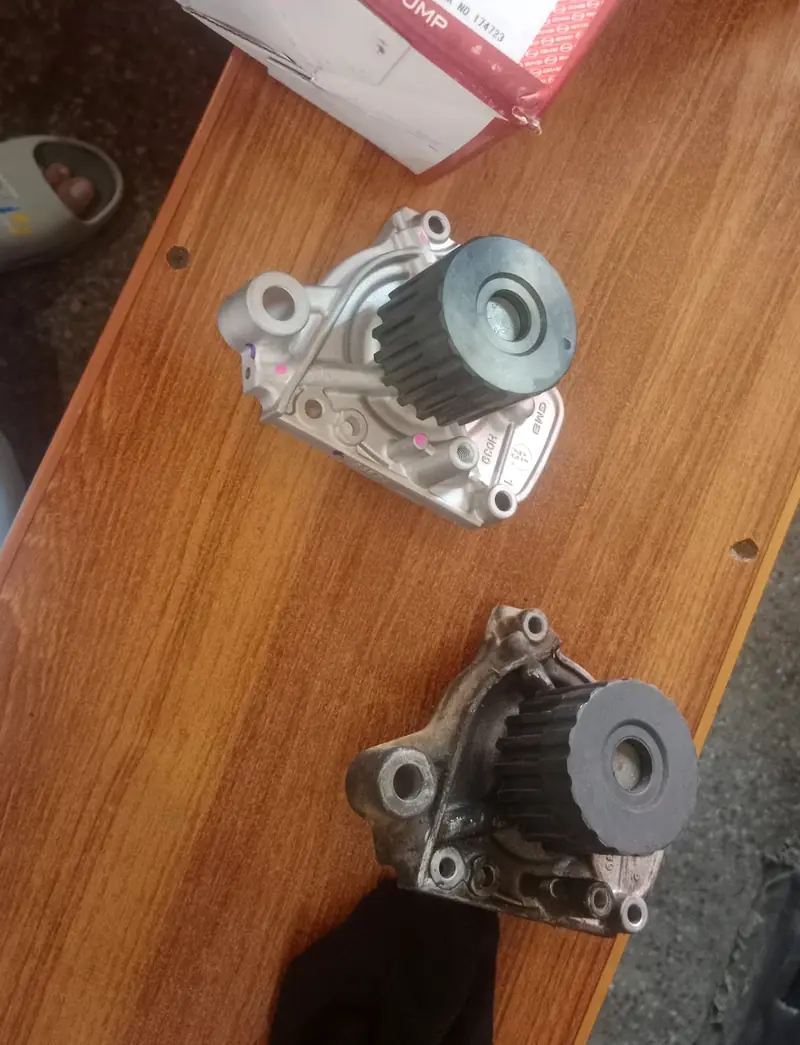 Two water pumps on the counter at New Nomi Autos